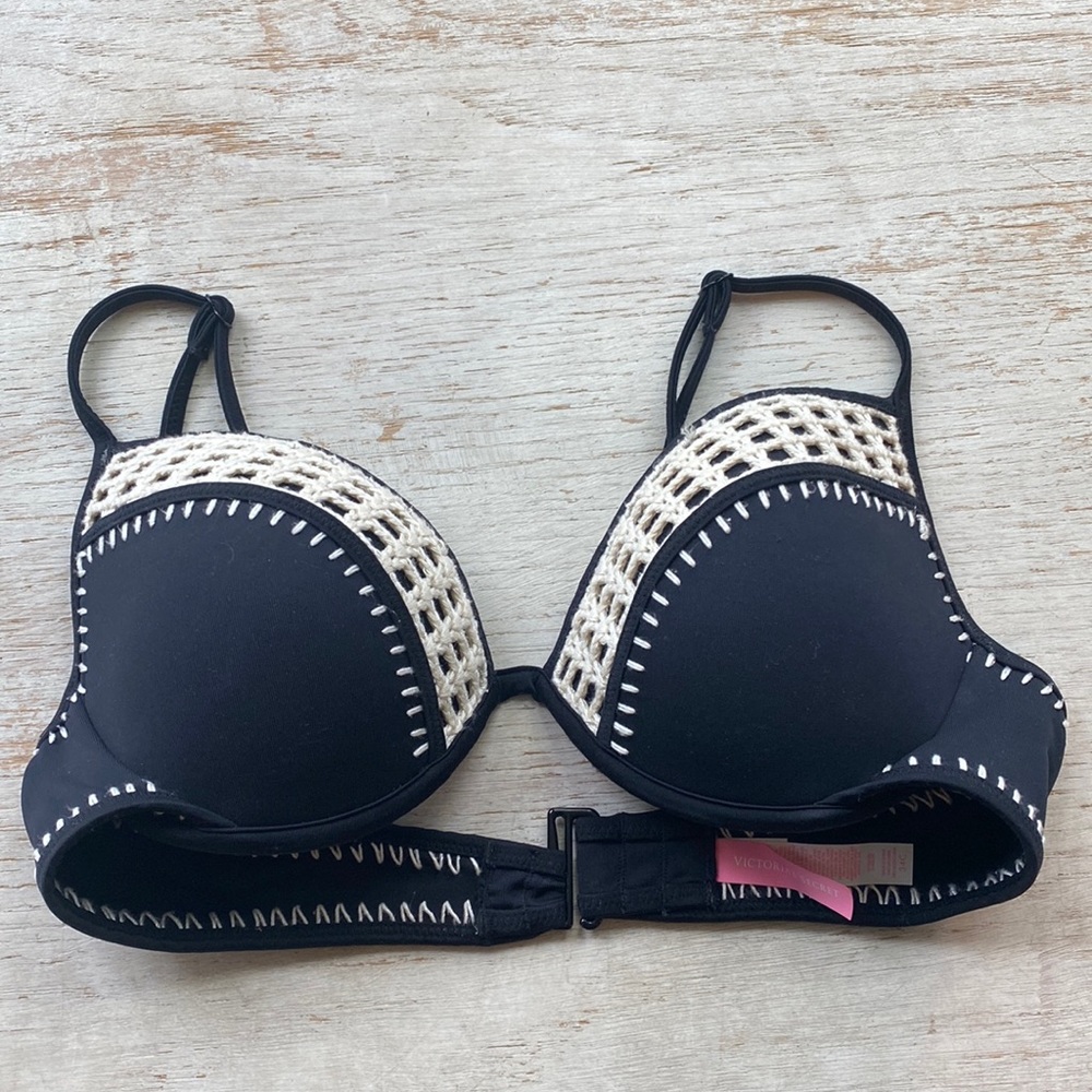 Victoria Secret swim top. NWOT. Black with off white crochet. Size 34C
